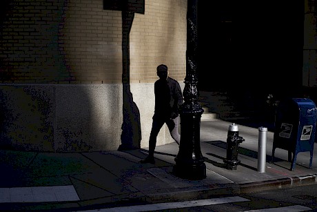 New York City Street Photography shadow and sunshine captured by Nick Dolding London photographer represented by Horton-Stephes Photographers' agents