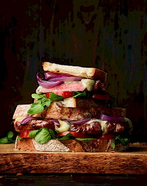 Horton-Stephens photographer Chelsea Bloxsome captures lifestyle images of people cooking tasty food in a studio. Sandwich with cooked ingredients.