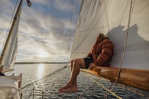 henri lloyd menswear campaign shot by best lifestyle photographer James Bowden aboard sailing ship represented by horton stephens photographers agency