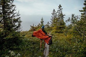 ames Bowden, UK  photographer, represented by Horton-Stephens photographer’s agents specialises in natural and authentic  lifestyle outdoors nature photographic images, this colour photo shows a female model outdoors in mountains on an adventure