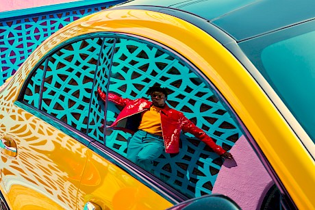 colourful car and portrait shot by Wilson Hennessy top London photographer represented by Horton-Stephens agency