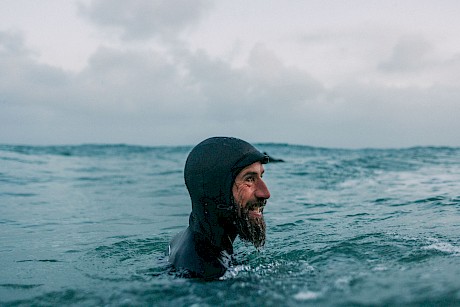 bearded man in water shot by James Bowden top outdoor and lifestyle photographer represented by Horton Stephens agency