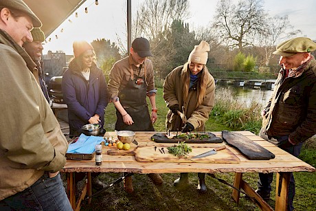 preparing fresh fish outdoors capyuted by top lifestyle photographer Jack Terry represented by Horton Stephens photographers agents based in London