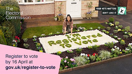 woman kneeling by her garden where the flowers spell out I'm Registered to Vote campaign by The Electoral Commission shot by top photographer Nick Dolding represented by photographers agents Horton Stephens photography