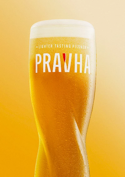 top still life photographer jessica griffiths shoots curvy beer glass for Pravha beer represented by horton stephens photography agents