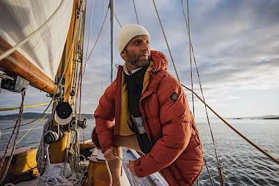 top British lifestyle outdoor photographer James Bowden shoots campaign for Henri Lloyd on yacht sailing the seas working with Horton Stephens photography agency